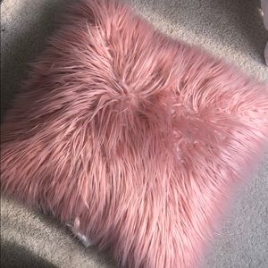 Light pink fluffy pillow
